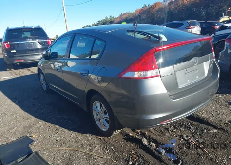 2010 Honda Insight Ex z USA, uszkodzony, nr VIN JHMZE2H7XAS012585